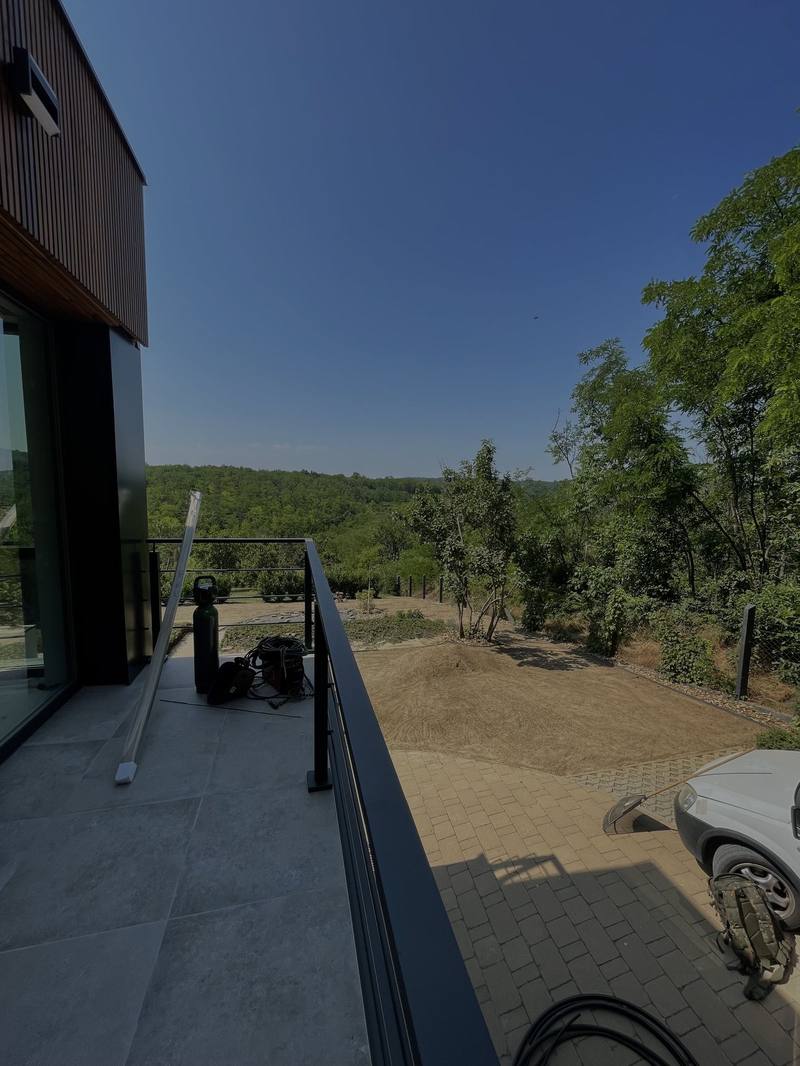 Grading and soil preparation before turfing, seen from the house terrace